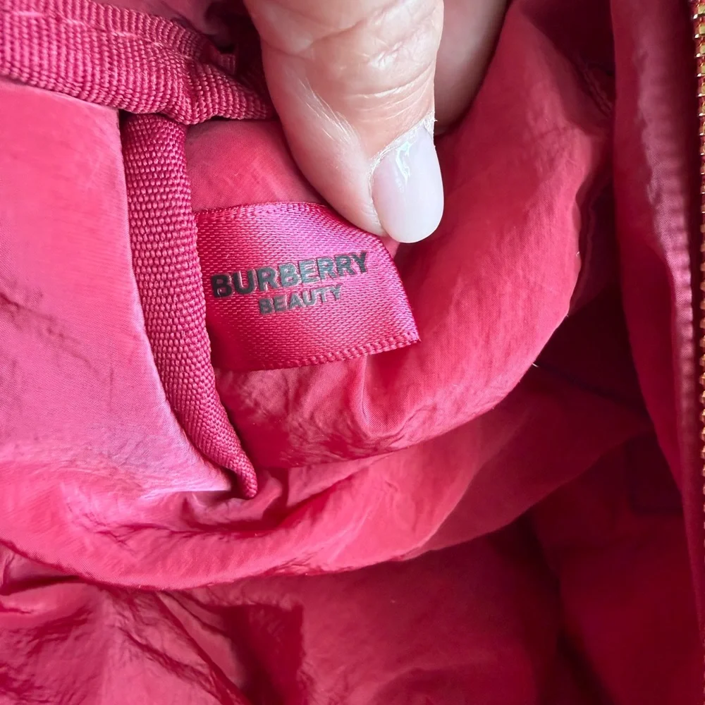 Burberry fuchsia makeup or cosmetics pouch